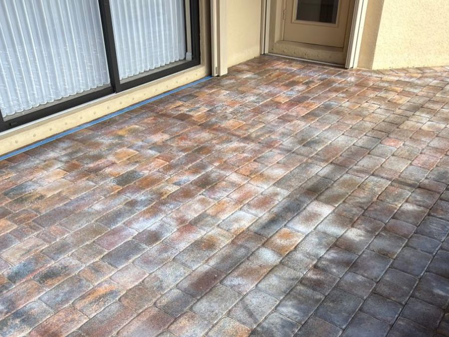 Efflorescence: a white, chalky haze on pavers