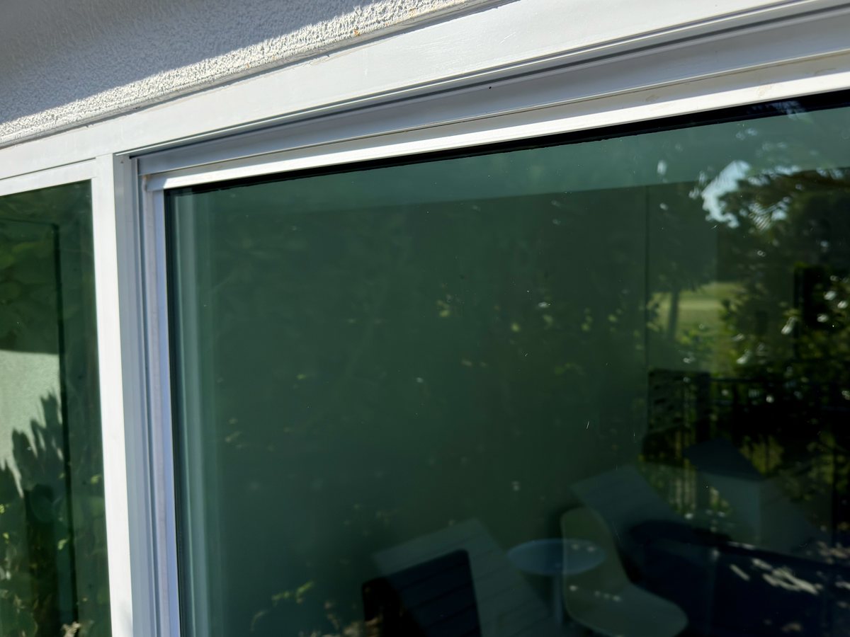 The same sliding window after cleaning, clear and spot-free