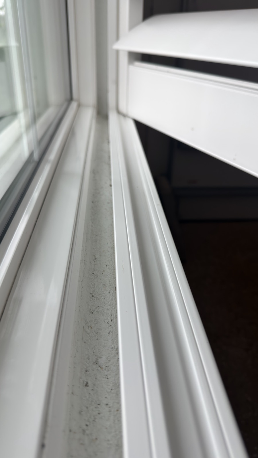 Same window track, clean and clear after cleaning
