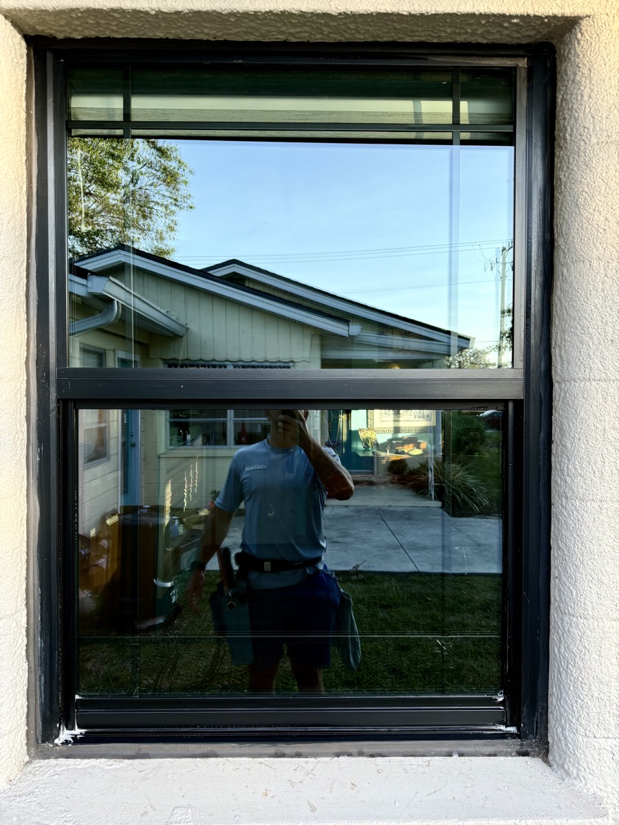 Another close-up view of hard water staining on a window pane